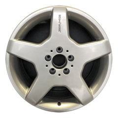 Front view of an 18x9-inch Mercedes ML550 AMG rim 65248. 2000-2003 Silver OEMwheels.forsale A1294011802