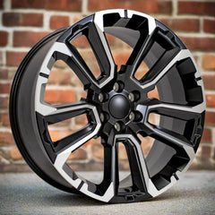 Angle view of a 24x10 Black Milled wheel replacement for Chevy Truck replica rim 9510998