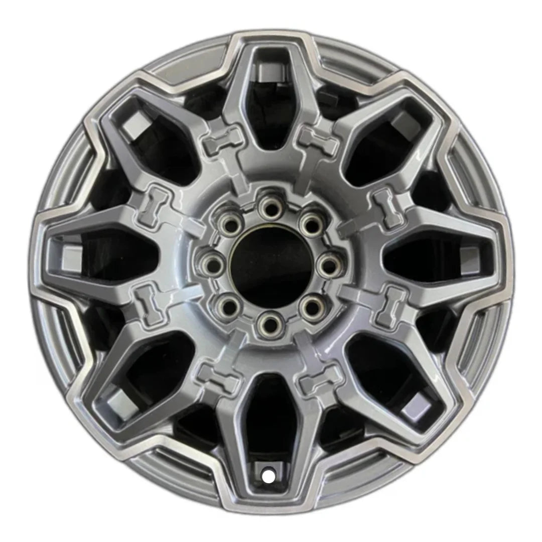 22-inch Hummer EV OEM wheel ALY14094U90. Polished Charcoal rim front view.